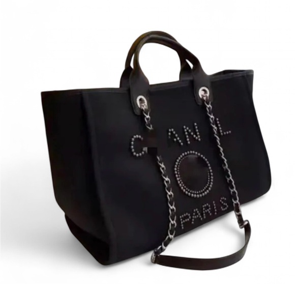 unbranded Handbags - Chic Black Studded Tote with Chain Handles and Gold Accents